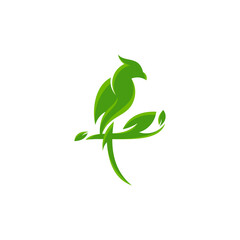 Green Bird Sitting On A Branch With Leaves.