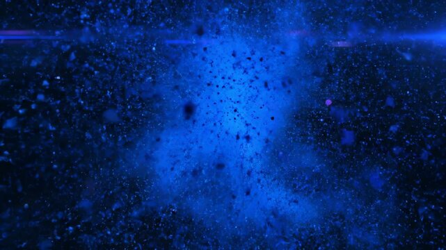 Abstract blue explosion of particles and light beams in dark space with lens flare effect