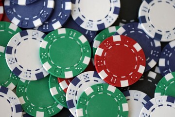 Poker Table With Poker Chips Turns In Casino. Many Poker Chips Spins on the Table