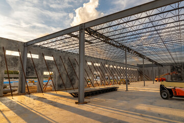 Development of commercial real estate in USA. Construction works on monolithic frame at large...