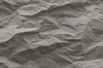 Brown crumpled recycled paper texture background. Kraft Paper