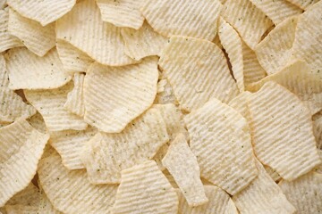 Homemade Flavored Paprika Potato Chips in a Bowl, top view. Flat lay