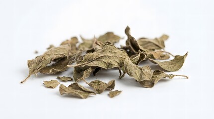 Dried green leaves on a white background, natural herbal tea ingredients.