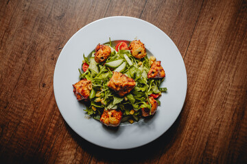 ceasar chicken salad with vegetables