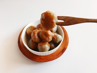 Cilok is a traditional food from Bandung, West Java, Indonesia. This food made from tapioca flour and serve with spicy peanut sauce