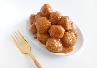 Cilok is a traditional food from Bandung, West Java, Indonesia. This food made from tapioca flour and serve with spicy peanut sauce