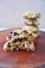 Close-up of homemade chocolate chip cookies with a soft and chewy texture, showing melted chocolate pieces inside