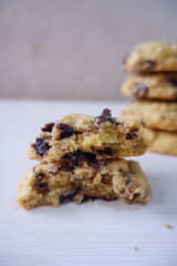 Close-up of homemade chocolate chip cookies with a soft and chewy texture, showing melted chocolate pieces inside