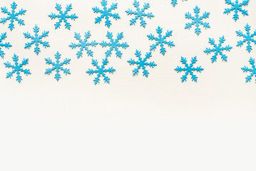 snowflakes on blue background. Blue snowflake background. Snowflake texture.