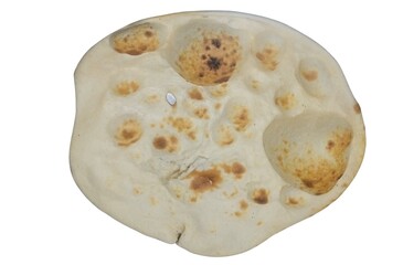 Freshly baked indian naan bread with characteristic bubbles and light charring
