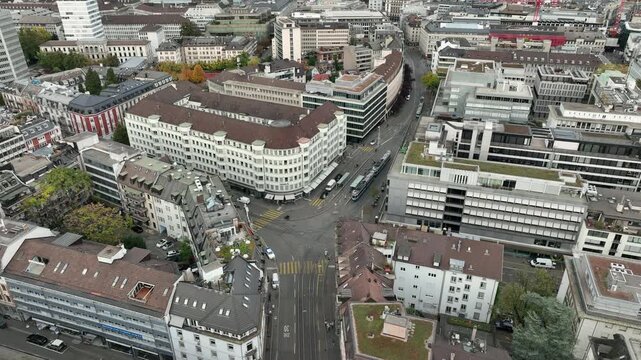 day time flight over zurich city center traffic streets aerial panorama 4k switzerland  