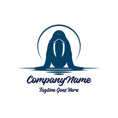 Obraz premium Walrus Head Silhouette in Water Vector Logo Illustration