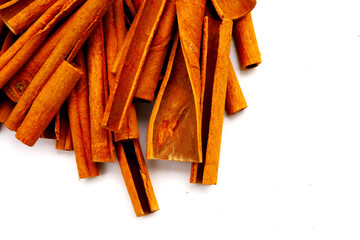 Dried cinnamon sticks arranged in a bundle.