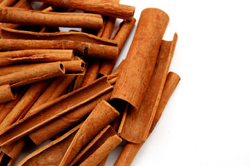 Dried cinnamon sticks arranged in a bundle.