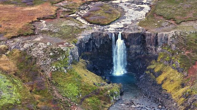 Aerial view of the Gufufoss falls near Seydisfjordur fjord - Iceland