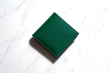Fototapeta premium Green diamond shape on white background with shadow