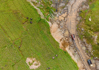 Mine Work of Dump Trucks in Rock Quarry with workers, Construction and mining site view from above 