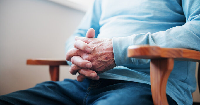 Hands, mental health and senior man in home with anxiety, decision or hope for loneliness. Choice, thinking and elderly male person in retirement with reflection, nostalgia or waiting in apartment. - Powered by Adobe
