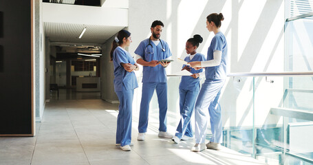 People, doctors and meeting with tablet in hospital for planning, medical report and schedule notes. Staff, digital and team brainstorming for operation, healthcare checklist and treatment records