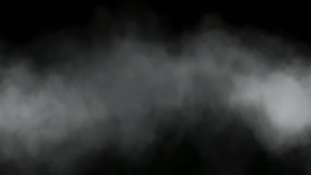 Wispy gray clouds against a dark, shadowy background