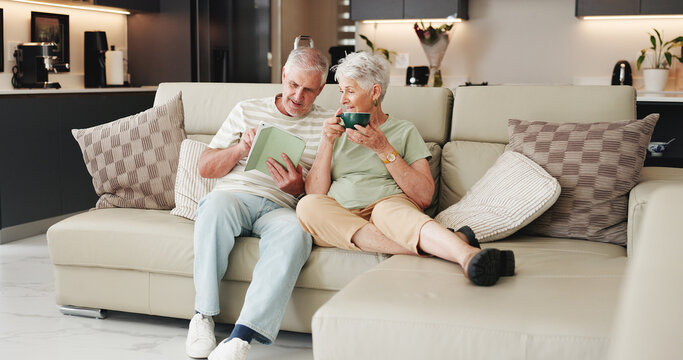 Coffee, retirement and tablet with old couple on sofa in living room of home together for break. App, bonding and relax with senior people drinking beverage in apartment for streaming or wellness - Powered by Adobe