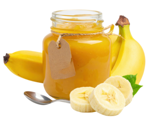Jar of Banana Puree with Fresh Bananas and Sliced Fruit