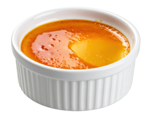 Creamy Cr��me br��l��e in a white ramekin, with caramelized su