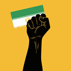 Raised fist holding the flag of iran, concept of freedom and revolution movement.