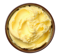 Creamy yellow butter with swirled texture in dark brown bowl viewed from above, isolated on transparent background