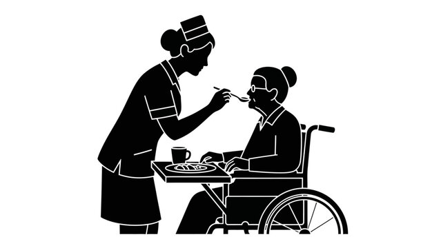 Caregiver feeding an elderly person in a wheelchair