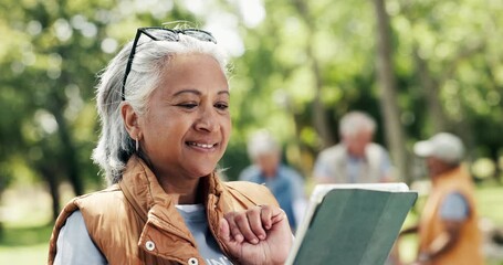 Volunteer, tablet and old woman in park, donation and community service with internet. People, outdoor and tech with social responsibility, connection and digital app for schedule and food charity - Powered by Adobe