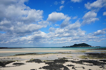 fascinating seascape with island and clouds