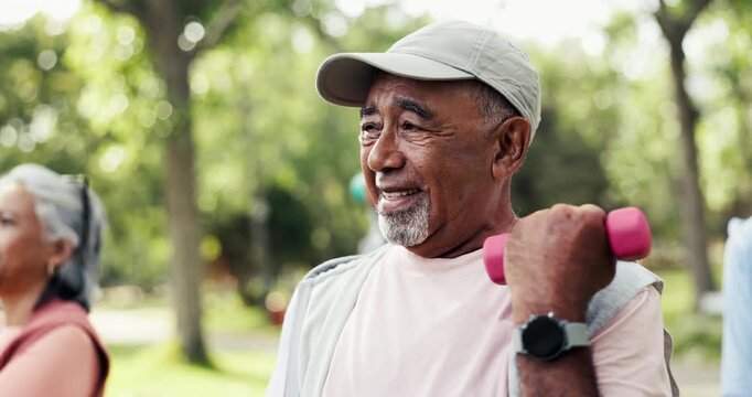 Fitness class, old man and exercise outdoor with dumbbells for joint health, mobility and wellness. Active, elderly person and happiness in park with weights for group, workout and strength training.