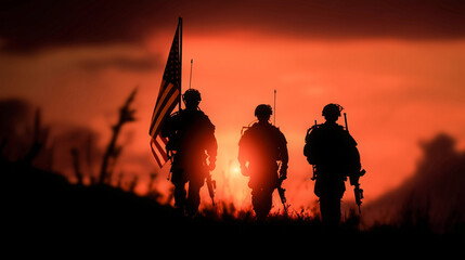Silhouettes armed soldiers marching with the US flag at sunset. Dramatic backlight scene symbolizing American patriotism, military service, sacrifice, courage, teamwork, freedom, national defense.