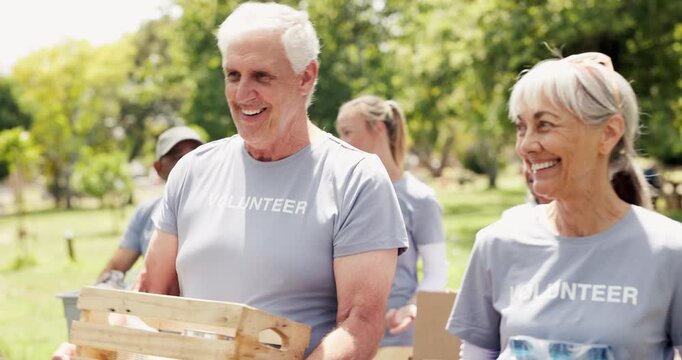 Volunteer, walk or old people in park with donations, social chat or collaboration in food drive campaign. Stroll, laugh or team outdoor with crate, charity work or distribution in senior outreach.