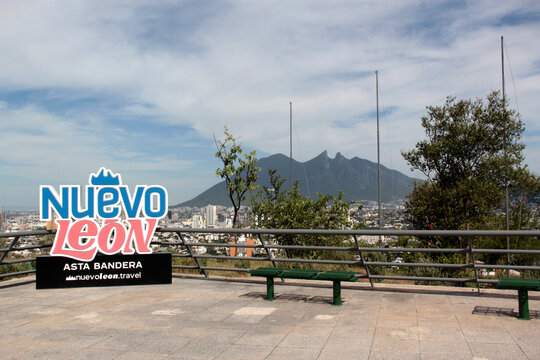 Monterrey, Nuevo Leon, Mexico - Jul 30, 2025: Sign of Nuevo Leon with Cerro de la Silla in the background at the Mirador del Obispado de Monterrey