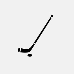 hockey stick and puck