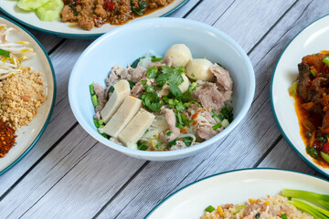 Noodles with pork and pork balls with soup Thai style.