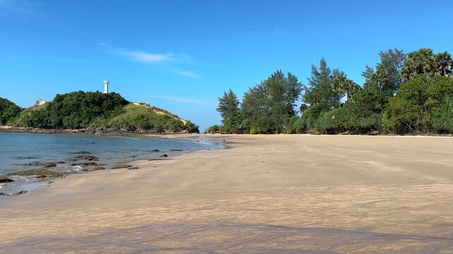 Ko Lanta beach with palm trees and tropical coastline in Krabi Thailand