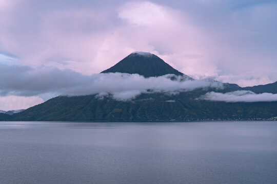 Scenic Landscape of Lake Atitlan and Volcano in Guatemala with Clouds