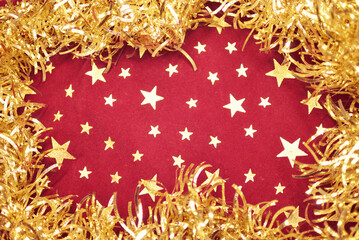クリスマスツリーガーランドで囲った星柄の布　きらきらなパーティー装飾フレーム　コピースペース
