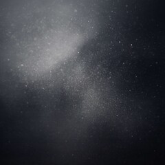 Obraz premium Dust particles floating in air against dark background with spotlight