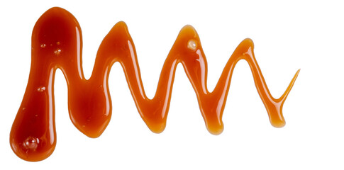 Isolated caramel topping spread on a white background