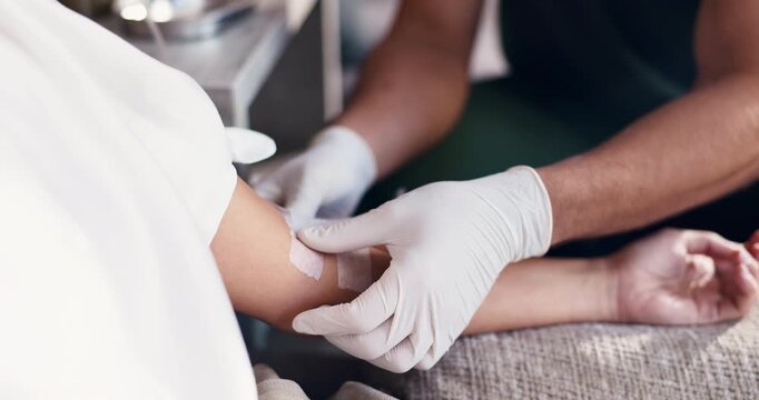 Hands, iv and wellness with people in drip lounge for arm preparation, benefits or recovery. Fluid, healthcare or medical infusion with customer and nurse in clinic for mineral or vitamin solution