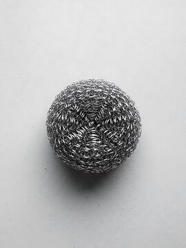 Macro Shot of an Abstract Circular Stainless Steel Scouring Pad Object