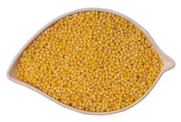 Isolated leaf-shaped container with millet on a white background