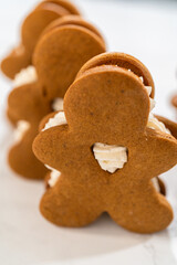 Handcrafted Gingerbread Cookie Sandwiches with Eggnog Buttercream