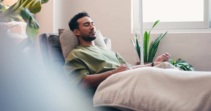 IV, relax and wellness with man in drip lounge for benefits of antioxidants, minerals or vitamins. Fluid, hydration and recovery with person in chair for healthcare, infusion or medical treatment