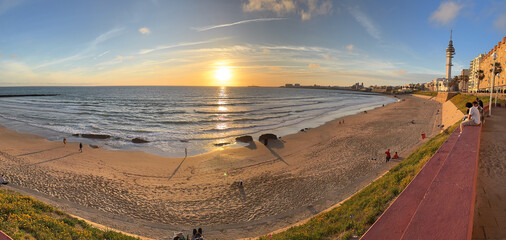 Cadiz, Spain - April 16, 2025: Typical view of the Bay of Cadiz with the sea in the foreground in the city of Cadiz, Spain © josevgluis
