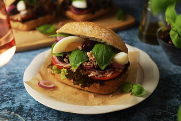 Traditional French sandwiches Pan Bagnat with tuna and salad niсoise	